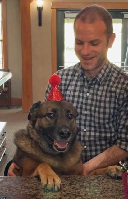 Paul Scott Lipof with Maycee, the firm's office greeter